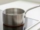 Saucepan vs saucier side by side comparison on a kitchen countertop