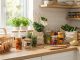 Hands organizing fresh vegetables in glass jars and breathable bags on counter.
